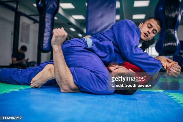 jujitsu fighters - brazilian culture stock pictures, royalty-free photos & images