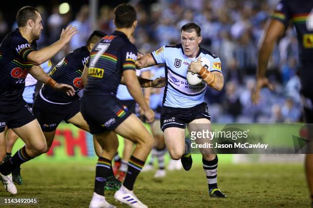Paul Gallen of the Sharks runs the ball during the round 6 NRL rugby league match between the Sharks and the Panthers at PointsBet Stadium on April...