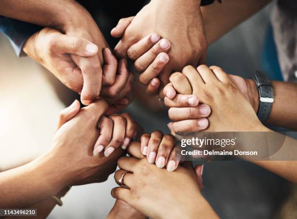 lend a helping hand - religious unity stock pictures, royalty-free photos & images