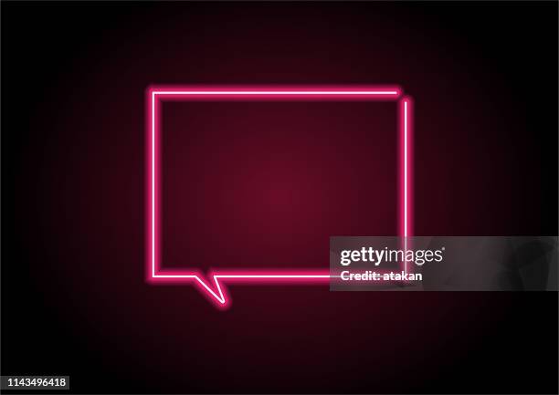 red speech bubble neon light on black wall - neon speech bubble stock illustrations