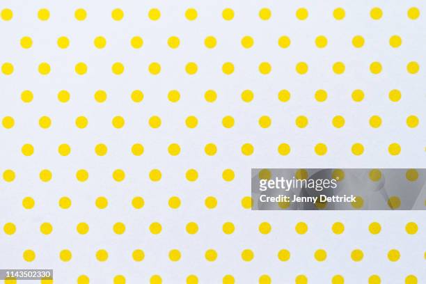 yellow polka dots - polka dot stock pictures, royalty-free photos & images
