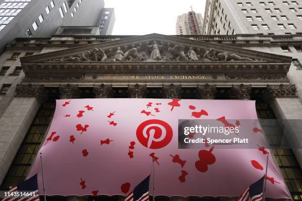 Banner for the online image board Pinterest Inc. Hangs from the New York Stock Exchange on the morning that Pinterest Inc. Makes its initial public...