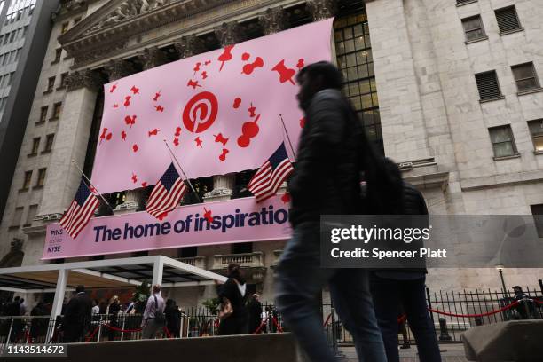 Banner for the online image board Pinterest Inc. Hangs from the New York Stock Exchange on the morning that Pinterest Inc. Makes its initial public...