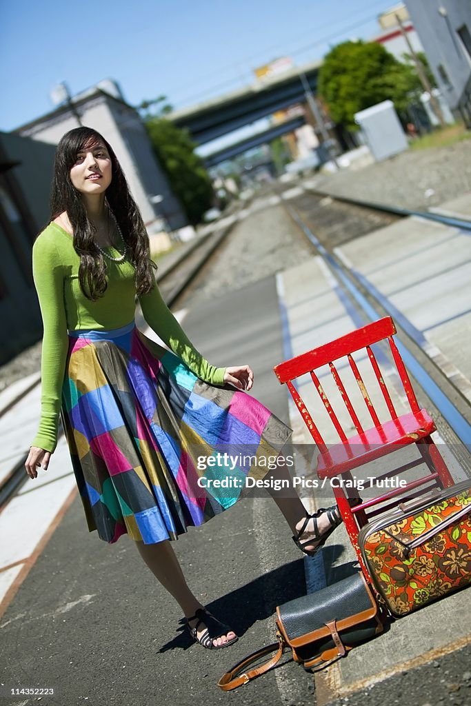 Teenage Girl Waiting For The Train In Downtown: Portland, Oregon, United States Of America