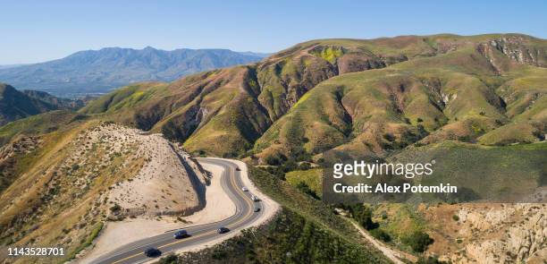 aerial view of the twisty highway grimes canyon road nearby moorpark, california, in the sunny day. - moorpark stock pictures, royalty-free photos & images