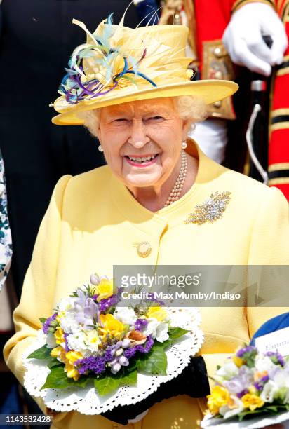 Queen Elizabeth II attends the traditional Royal Maundy Service at St George's Chapel on April 18, 2019 in Windsor, England. During the service The...