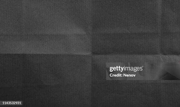 black paper texture background - plegado fotografías e imágenes de stock