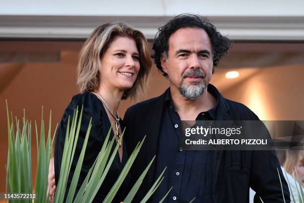 Mexican director and President of the Jury of the Cannes Film Festival Alejandro Gonzalez Inarritu and his wife Maria Eladia Hagerman pose on May 13,...