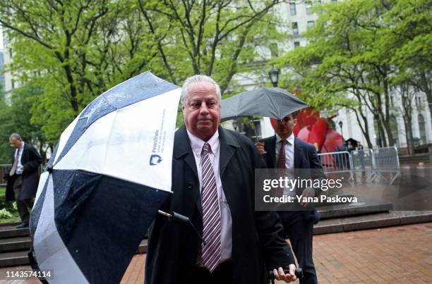 The lawyers for Officer Daniel Pantaleo enter One Police Plaza before his trial on May 13, 2019 in New York City. Officer Pantaleo faces charges of...