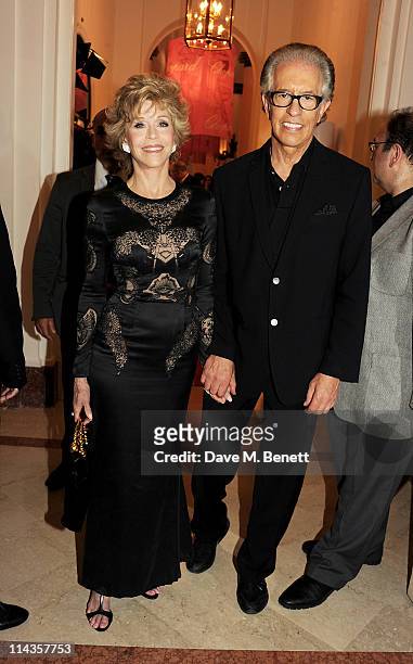 Actress Jane Fonda and Richard Perry attend the Cinema For Peace inaugural Cannes dinner honoring Sean Penn for his charity work in Haiti and...