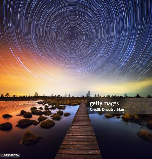 star trails over high fens (hohes venn) nature reserve - long exposure light trails stock pictures, royalty-free photos & images