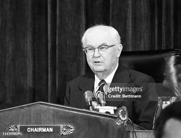 Representative Wright Patman , chairman, presides at a session of the ...