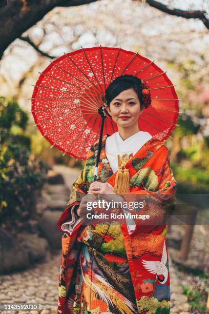 beautiful japanese woman in kimono - wedding umbrella stock pictures, royalty-free photos & images