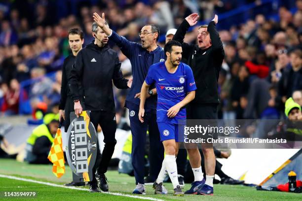 Pedro of Chelsea walks from the pitch after being substituted as Chelsea manager Maurizio Sarri gestures during the UEFA Europa League Quarter Final...