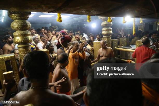 April 2019, India, Pamba: Believing Hindus pray to the god Ayyappa in the Sabarimala temple in South India. After India's Supreme Court declared a...