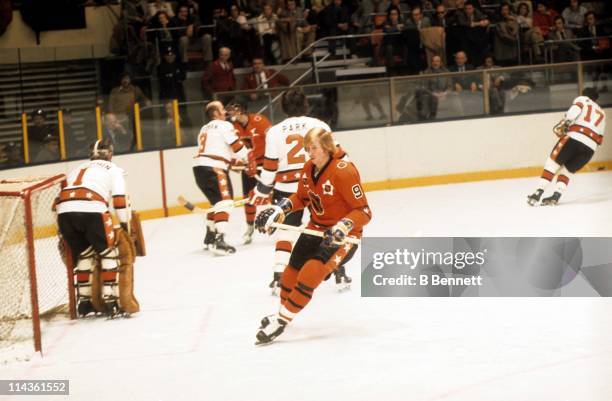 Garry Unger of the St. Louis Blues and Team West skates on the ice as goalie Ed Giacomin and Brad Park of the New York Rangers and Team East defend...