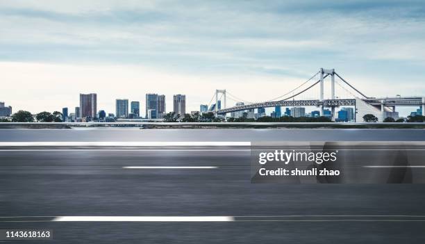 urban road - horizontal road stock pictures, royalty-free photos & images