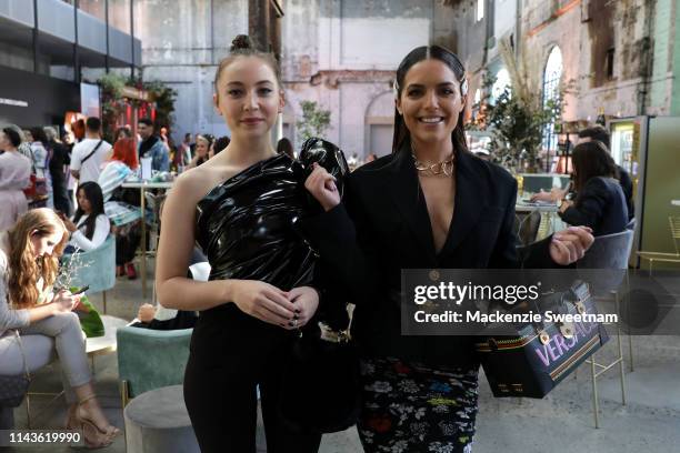 Mavournee Hazel and Olympia Valance attend Mercedes-Benz Fashion Week Resort 20 Collections at Carriageworks on May 14, 2019 in Sydney, Australia.