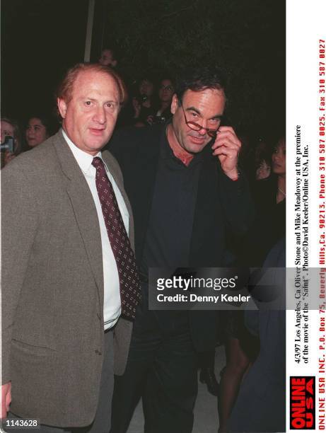 Los Angeles, Ca Oliver Stone and Mike Meadovoy at the prmeire of "The Saint"