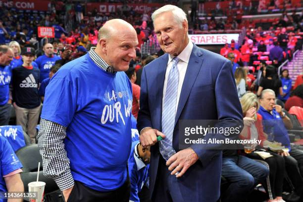 Steve Ballmer and Jerry West attend an NBA playoffs basketball game between the Los Angeles Clippers and the Golden State Warriors at Staples Center...