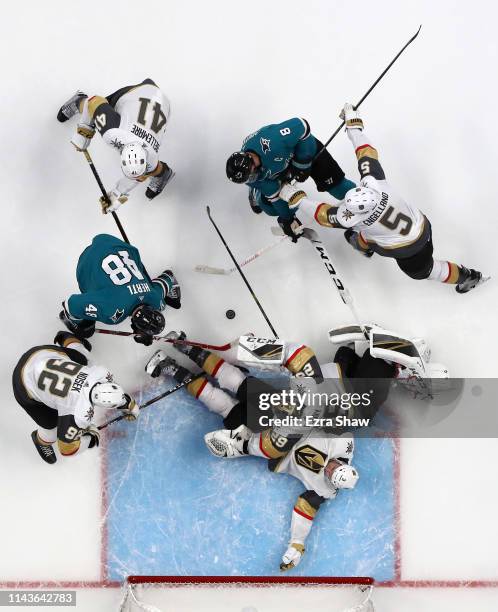 Brayden McNabb, Deryk Engelland, Tomas Nosek, Pierre-Edouard Bellemare, and goalie Marc-Andre Fleury of the Vegas Golden Knights are able to stop...