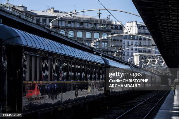 This picture taken on May 13, 2019 shows a restored Orient Express train displayed at the Gare de l'Est train station in Paris.