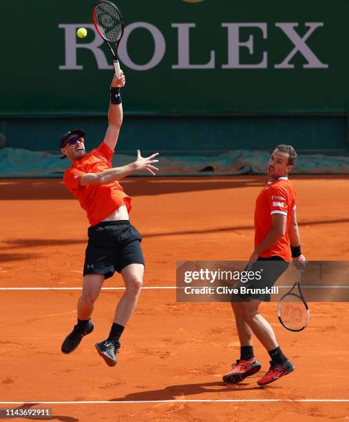 Jamie Murray of Great Britain and Bruno Soares of Brazil in action against Diego Schwartzman of Argentina and Joao Sousa of Portugal in their doubles...