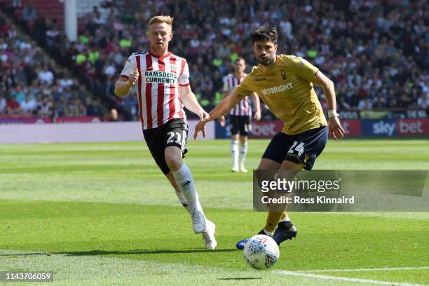 Mark Duffy of Sheffield United and Claudio Yacob of Nottingham Forest in action during the Sky Bet Championship match between Sheffield United and...