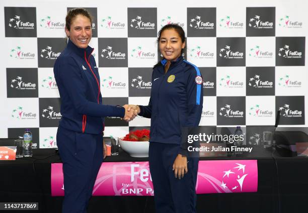 Johanna Konta of Great Britain shakes hands with her first opponent Zarina Diyas of Kazakhstan prior to the Fed Cup World Group II Play-Off match...