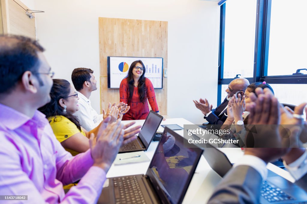 Successful Businesswoman Applauded by her Colleagues