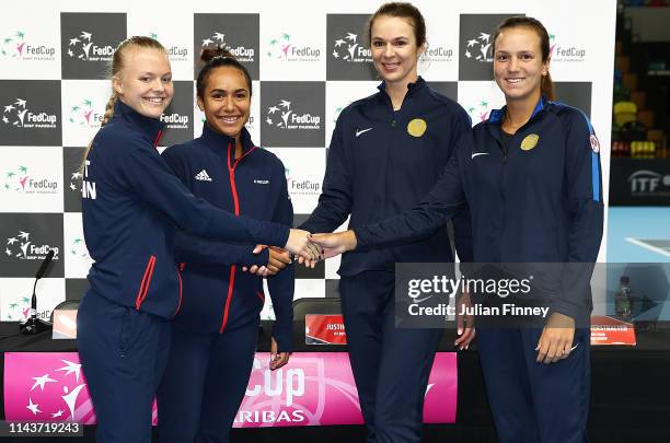 Doubles pairing Harriet Dart and Heather Watson along side Kazakhstan's doubles team of Anna Danilina and Galina Voskoboeva prior to the Fed Cup...