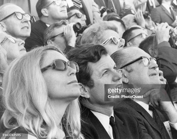 Close-up of married American couple Joan Kennedy and politician US Senator Edward Kennedy on a viewing stand near the Kennedy Space Center as they...