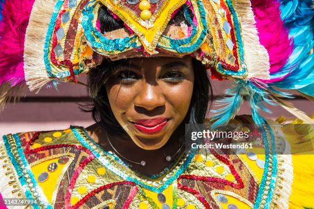 bahamas, nassau, woman posing in a colorful carneval costum - nassau bahamas stock pictures, royalty-free photos & images