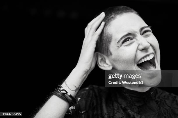 portrait of screaming young woman - black and white portrait stock pictures, royalty-free photos & images