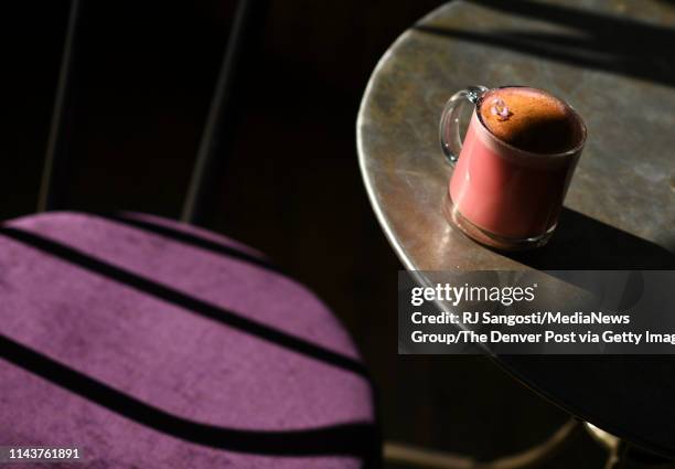 Taproot superfood latte with "nbeet root powder, ginger, coconut milk and honey "nat The Corner Beet on April 19, 2019 in Denver, Colorado.