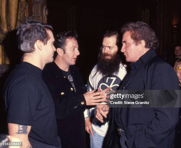 Henry Rollins, Joe Strummer, Rick Rubin and Johnny Cash during Johnny Cash Concert Arrivals at The Pantages Theatre in Los Angeles, California,...