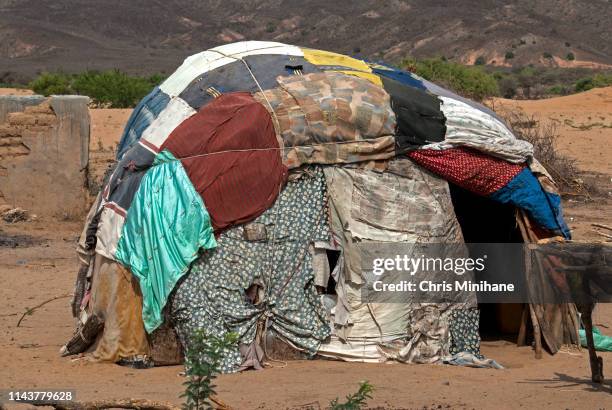 temporary housing structure made from clothing - makeshift shelter stock pictures, royalty-free photos & images