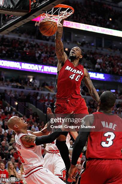 Udonis Haslem of the Miami Heat dunks against Keith Bogans of the Chicago Bulls in Game Two of the Eastern Conference Finals during the 2011 NBA...