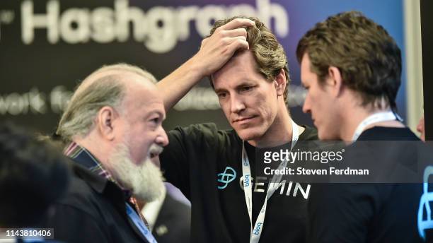David Chaum, Tyler Winklevoss and Cameron Winklevoss attend Consensus 2019 at the Hilton Midtown on May 13, 2019 in New York City.