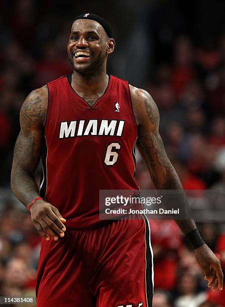 LeBron James of the Miami Heat smiles as he looks on against the Chicago Bulls in Game Two of the Eastern Conference Finals during the 2011 NBA...