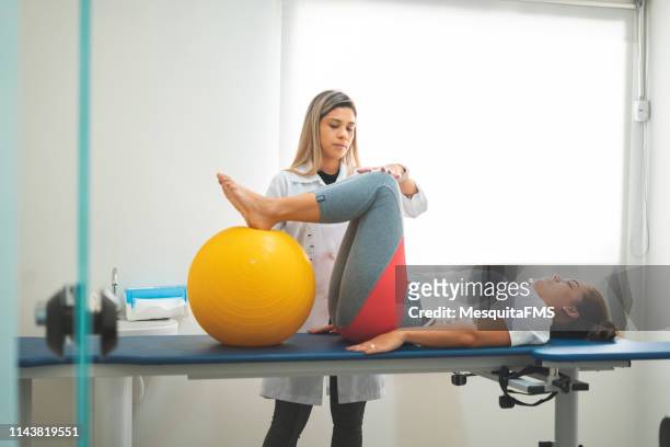 occupational therapy with women - competitive examination exam stock pictures, royalty-free photos & images