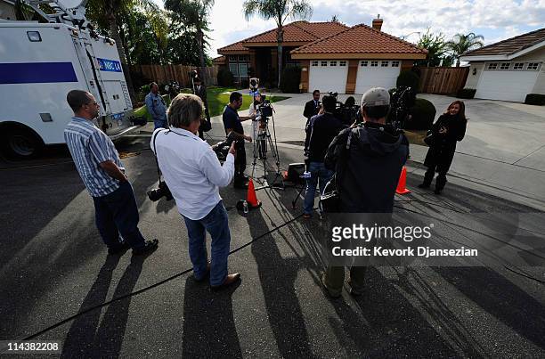 Member of the news media do their stand up outside the home of Mildred Patricia Baena, former household staff member who mothered a child with former...