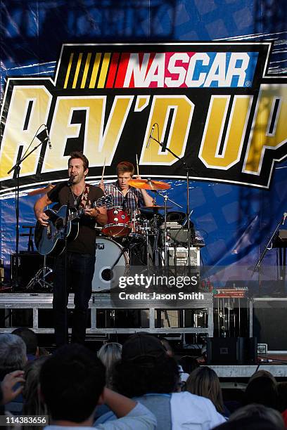 American singer and songwriter Josh Kelley performs for fans during the NASCAR Rev'd Up Concert at the NASCAR Hall of Fame on May 18, 2011 in...