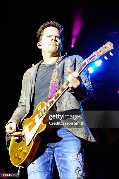 American country music artist Gary Allan performs for fans during the NASCAR Rev'd Up Concert at the NASCAR Hall of Fame on May 18, 2011 in...