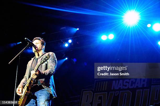 American country music artist Gary Allan performs for fans during the NASCAR Rev'd Up Concert at the NASCAR Hall of Fame on May 18, 2011 in...