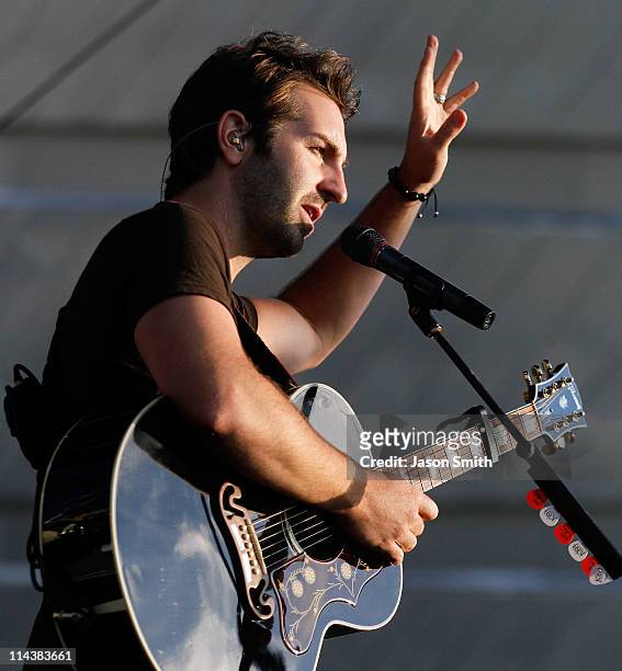 American singer and songwriter Josh Kelley performs for fans during the NASCAR Rev'd Up Concert at the NASCAR Hall of Fame on May 18, 2011 in...