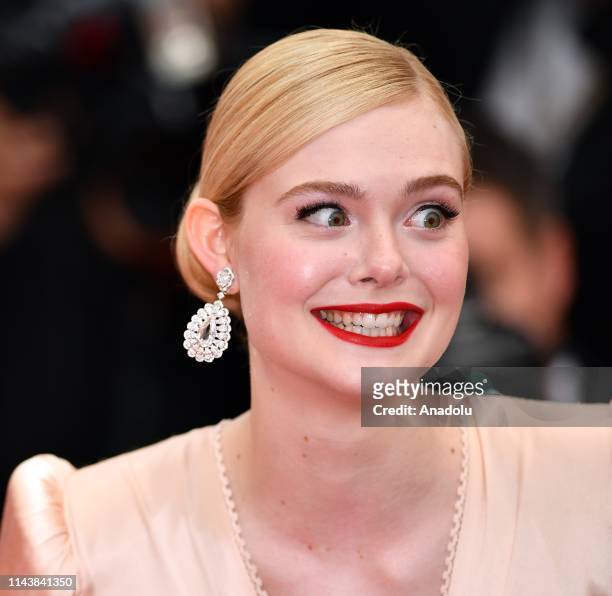 Jury member US actress Elle Fanning arrives for the screening of the film 'The Dead Don't Die' and the Opening Ceremony at the 72nd annual Cannes...