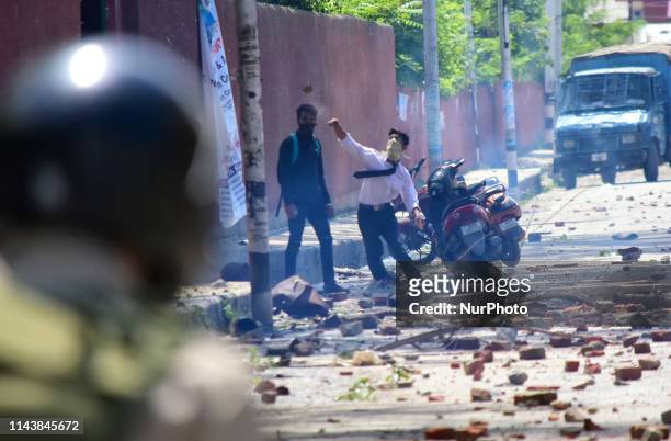 Students clash with Indian Government Forces during protest against the alleged rape of 3 Year old girl at Amar Singh College Srinagar, Indian...