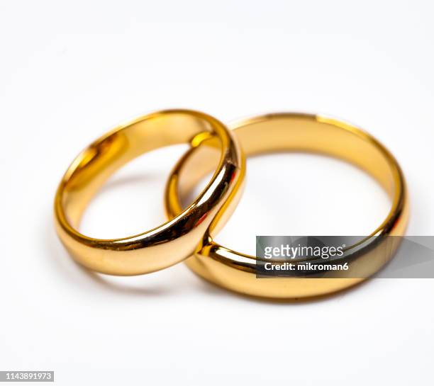 close-up of wedding rings - open round two stock pictures, royalty-free photos & images