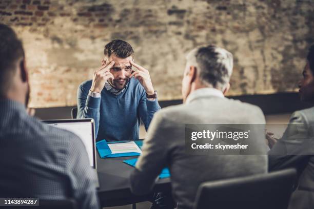 displeased candidate having a job interview with human resource team. - disappoint bussiness meeting stock pictures, royalty-free photos & images